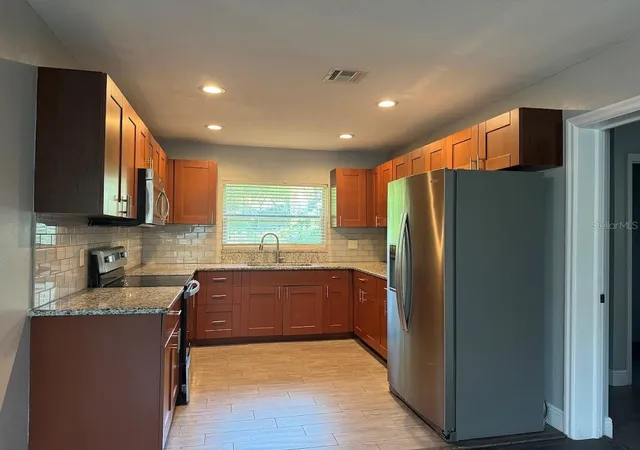 Photo 2 of Single family home for sale at 2125 Carlton Dr, Orlando, FL 32806 | MLS# O6432250 | Listing updated on 2026-08-25