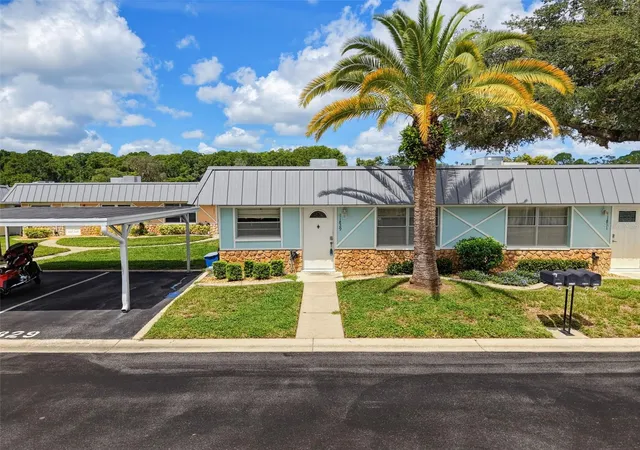 Photo 2 of Condo for sale at 11829 Carissa Ln #A, New Port Richey, FL 34654 | MLS# TB8537474 | Listing updated on 2026-08-28