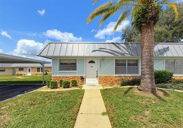 Listing Photo 3 - Condo for sale in building located at 11829 Carissa Ln, NEW PORT RICHEY, FL 34654 - Unit #A