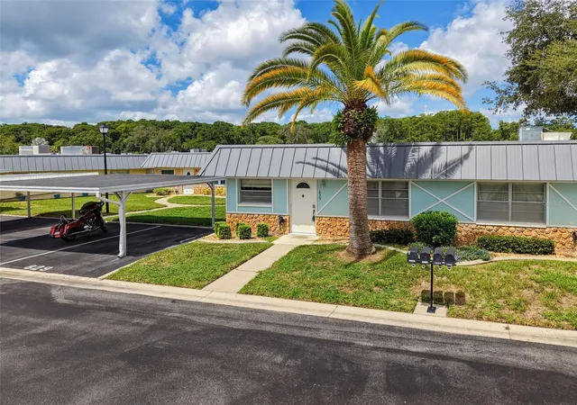 Photo 1 of Condo for sale at 11829 Carissa Ln #A, New Port Richey, FL 34654 | MLS# TB8537474 | Listing updated on 2026-08-28