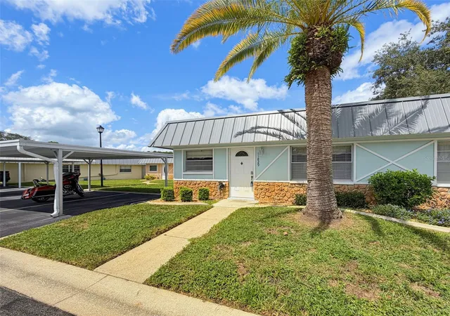 Listing Photo 4 - Condo for sale in building located at 11829 Carissa Ln, NEW PORT RICHEY, FL 34654 - Unit #A