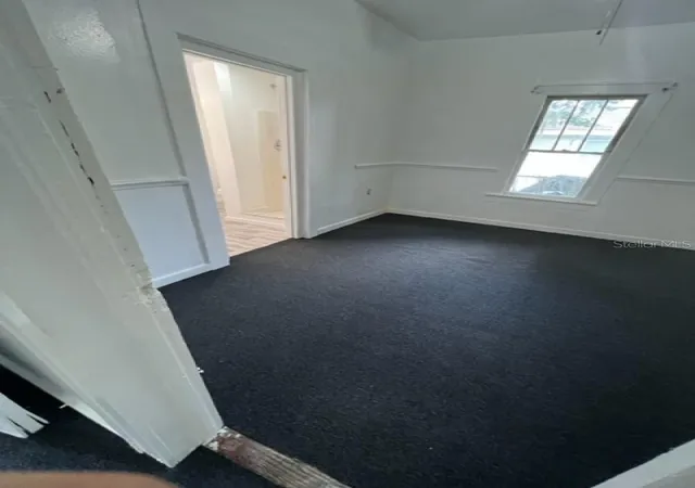 Photo 4 of Single family home for sale at 1031 N Florence Ave, Lakeland, FL 33805 | MLS# A4702588 | Listing updated on 2026-10-01