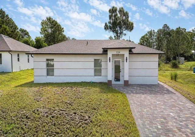 Photo 1 of Single family home for sale at 729 Anaconda Ave S, LEHIGH ACRES, FL 33974 | MLS# C7529445 | Listing updated on 2026-10-14