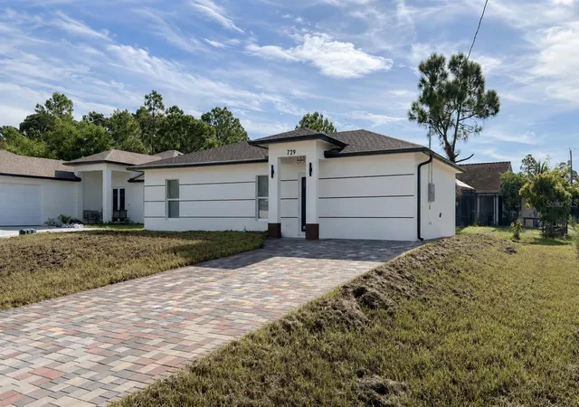 Photo 2 of Single family home for sale at 729 Anaconda Ave S, Lehigh Acres, FL 33974 | MLS# C7529445 | Listing updated on 2026-10-14