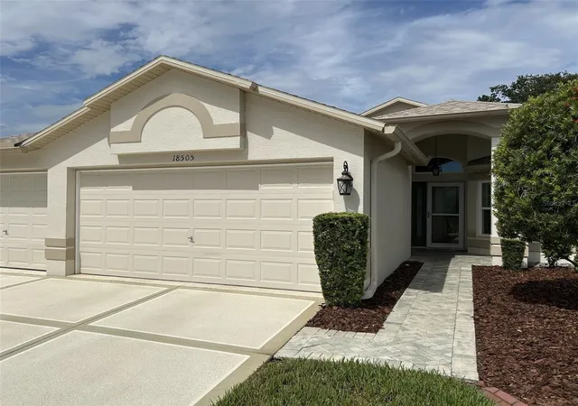 Photo 2 of Single family home for sale at 18505 Grand Clb Dr, Hudson, FL 34667 | MLS# TB8537593 | Listing updated on 2026-09-30