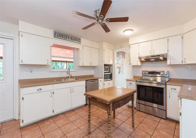 3rd image of 8719 Handcart Rd, Wesley Chapel, FL 33545 | MLS# TB8537594