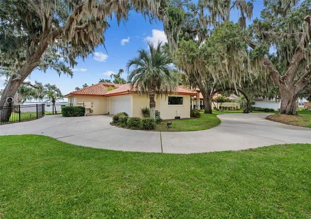 Photo 3 of Single family home for sale at 1412 Mosswood Dr, Leesburg, FL 34748 | MLS# O6432435 | Listing updated on 2026-09-01