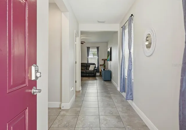 Photo 4 of Single family home for sale at 10229 Newminster Loop, Ruskin, FL 33573 | MLS# TB8537632 | Listing updated on 2026-09-30