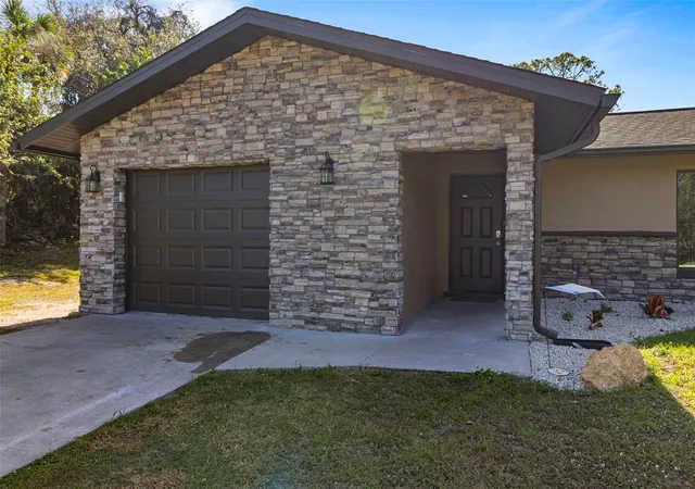 Photo 4 of Single family home for sale at 20495 Albury Dr, Port Charlotte, FL 33952 | MLS# O6432486 | Listing updated on 2026-08-12