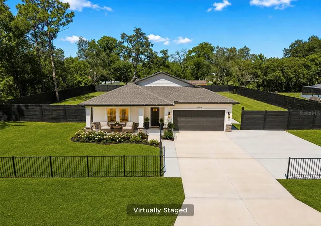 Photo 1 of Single family home for sale at 12326 Deep Crk Dr, Spring Hill, FL 34609 | MLS# TB8537681 | Listing updated on 2026-08-27