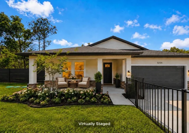 Photo 2 of Single family home for sale at 12326 Deep Crk Dr, Spring Hill, FL 34609 | MLS# TB8537681 | Listing updated on 2026-08-27