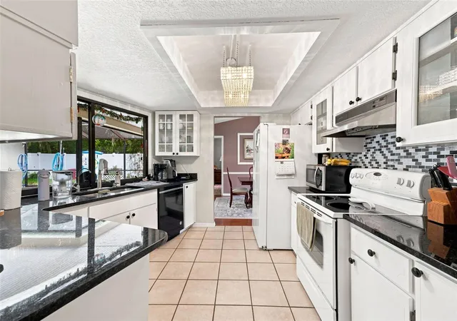 Photo 2 of Single family home for sale at 4292 Elwood Rd, Spring Hill, FL 34609 | MLS# W7888456 | Listing updated on 2026-09-16
