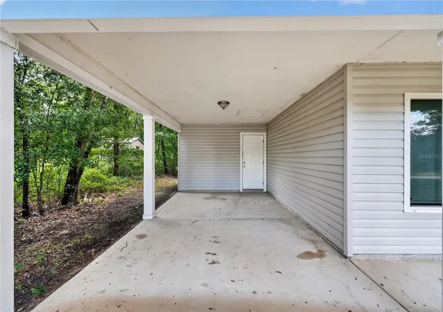 Photo 3 of Single family home for sale at 6255 Se 165th Court, Ocklawaha, FL 32179 | MLS# OM730128 | Listing updated on 2026-09-15