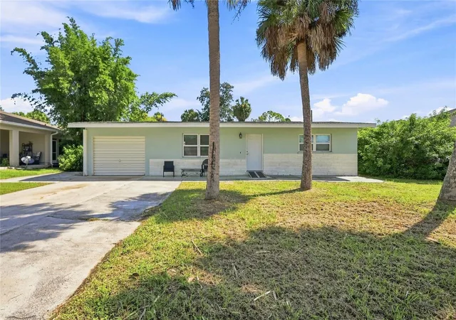 Photo 1 of Single family home for sale at 2618 Lakeshore Cir, Port Charlotte, FL 33952 | MLS# A4702668 | Listing updated on 2026-08-25
