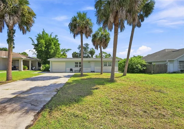 Photo 2 of Single family home for sale at 2618 Lakeshore Cir, Port Charlotte, FL 33952 | MLS# A4702668 | Listing updated on 2026-08-25