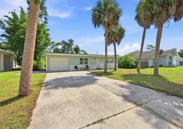 Photo 2 of Single family home for sale at 2618 Lakeshore Cir, Port Charlotte, FL 33952 | MLS# A4702668 | Listing updated on 2026-08-25