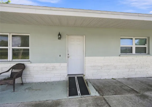 Photo 3 of Single family home for sale at 2618 Lakeshore Cir, Port Charlotte, FL 33952 | MLS# A4702668 | Listing updated on 2026-08-25