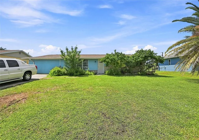 Photo 1 of Single family home for sale at 457 Garfield Ave Nw, Port Charlotte, FL 33952 | MLS# A4702669 | Listing updated on 2026-10-20