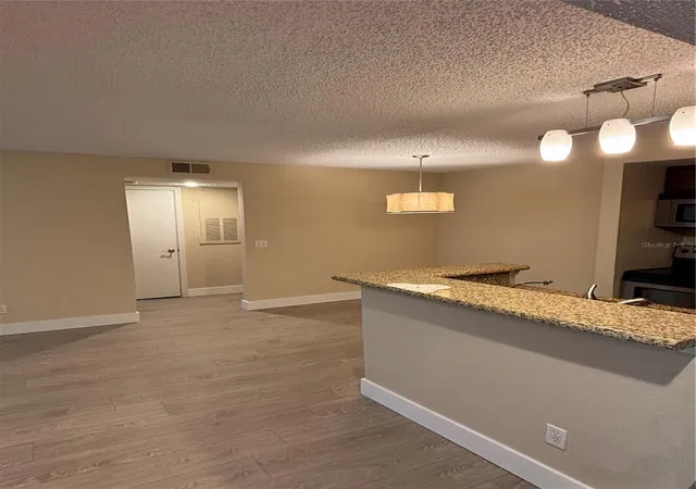 Photo 3 of Condo for sale at 5124 Conroy Rd #623, Orlando, FL 32811 | MLS# O6432606 | Listing updated on 2026-08-12