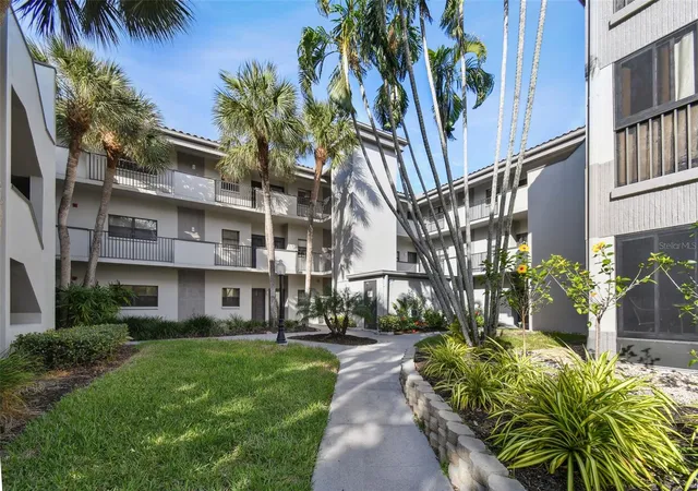 Listing Photo 1 - Condo for sale in building located at 2650 Countryside Blvd, CLEARWATER, FL 33761 - Unit #C309