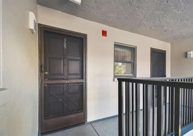 Listing Photo 3 - Condo for sale in building located at 2650 Countryside Blvd, CLEARWATER, FL 33761 - Unit #C309