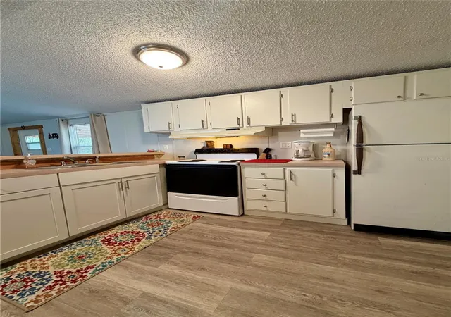 5th image of 20445 Ne 144Th Ln, Fort Mc Coy, FL 32134 | MLS# OM730158