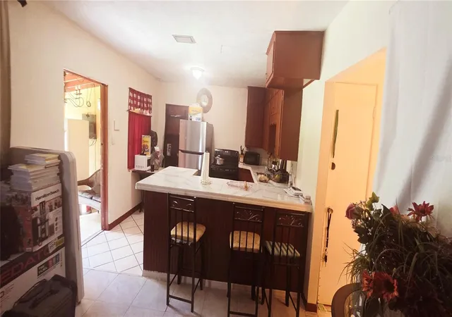 Photo 3 of Single family home for sale at 1135 Holden Ave #1/2, Orlando, FL 32839 | MLS# O6432651 | Listing updated on 2026-08-14