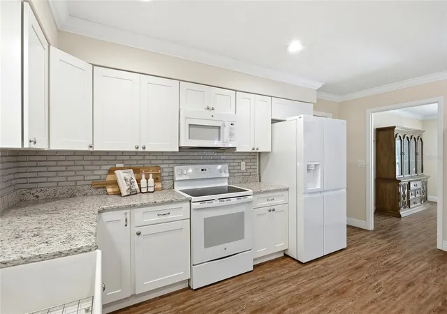 Photo 4 of Single family home for sale at 1150 Markham Woods Rd, Longwood, FL 32779 | MLS# O6432700 | Listing updated on 2026-10-04
