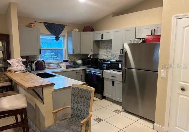 Photo 3 of Single family home for sale at 4001 Kaluga Park St, Orlando, FL 32808 | MLS# O6432788 | Listing updated on 2026-08-26