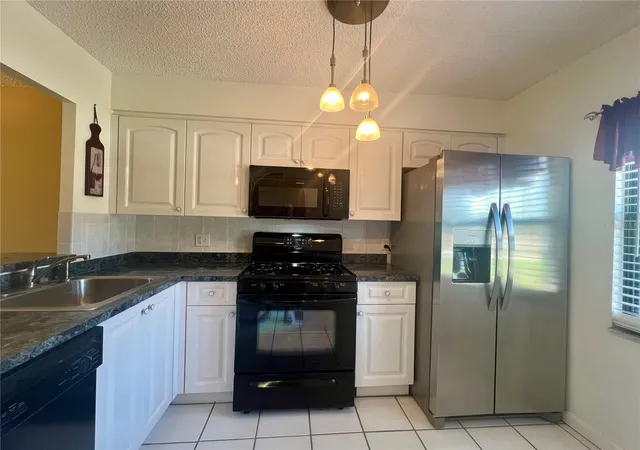 Photo 2 of Single family home for sale at 2989 Flint Dr N, Clearwater, FL 33759 | MLS# TB8537991 | Listing updated on 2026-09-26