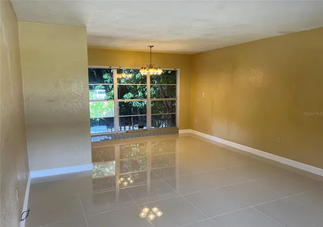 Photo 3 of Single family home for sale at 5847 Harrington Dr, Orlando, FL 32808 | MLS# O6432831 | Listing updated on 2026-10-20