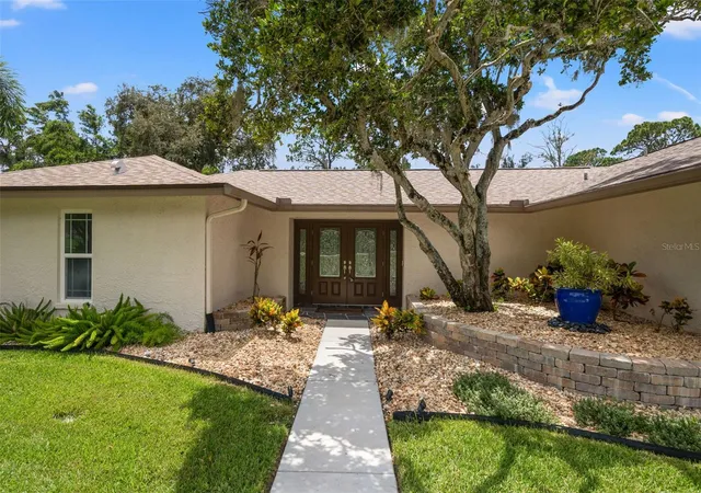 2nd image of 940 Rolling Hills Dr, Palm Harbor, FL 34683 | MLS# TB8538029