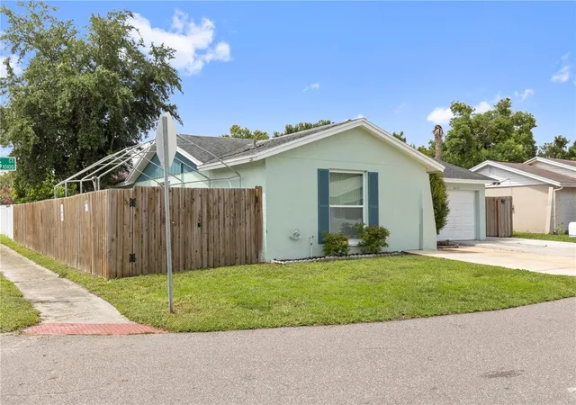 Photo 2 of Single family home for sale at 10112 Enchanted Oaks Ct, Tampa, FL 33615 | MLS# TB8538106 | Listing updated on 2026-09-30