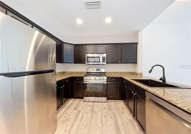Listing Photo 1 - Condo for sale in building located at 7510 Seven Eagles Wy, Kissimmee, FL 34747