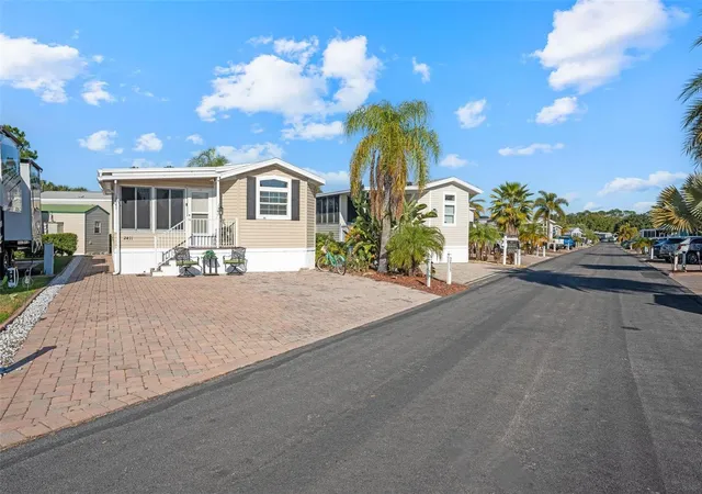 Photo 2 of Manufactured home for sale at 2411 Citrus Tree Rd, Clermont, FL 34714 | MLS# O6432953 | Listing updated on 2026-10-23