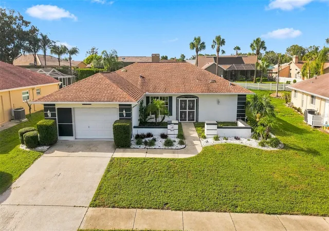 1st image of 10381 Flag Rd, Spring Hill, FL 34608 | MLS# W7888521