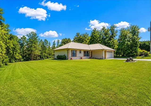Photo 2 of Single family home for sale at 21875 NE 135th Lane, Fort Mc Coy, FL 32134 | MLS# OM730230 | Listing updated on 2026-09-14