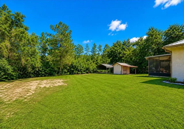 Photo 3 of Single family home for sale at 21875 NE 135th Lane, Fort Mc Coy, FL 32134 | MLS# OM730230 | Listing updated on 2026-09-14