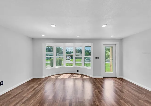 Photo 3 of Single family home for sale at 1516 Country Ln W, Clearwater, FL 33759 | MLS# TB8538223 | Listing updated on 2026-10-08