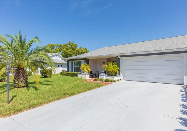 Photo 3 of Single family home for sale at 8423 Pebble Dr, Port Richey, FL 34668 | MLS# TB8538309 | Listing updated on 2026-10-05