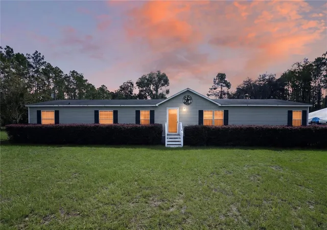 Photo 1 of Manufactured home for sale at 3560 Ne 71st Avenue, High Springs, FL 32643 | MLS# OM730271 | Listing updated on 2026-09-29