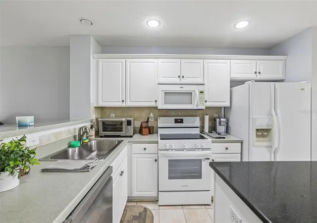4th image of 4864 Tuscan Loon Dr, Tampa, FL 33619 | MLS# TB8538315