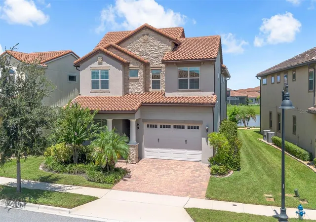 Photo 2 of Single family home for sale at 13031 Stanthorne Ave, Orlando, FL 32832 | MLS# O6433098 | Listing updated on 2026-08-14