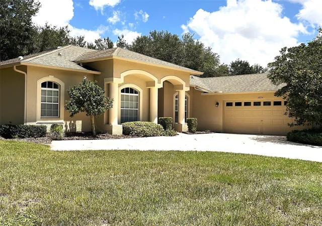 Photo 1 of Single family home for sale at 18754 Grand Clb Dr, Hudson, FL 34667 | MLS# TB8538349 | Listing updated on 2026-08-14