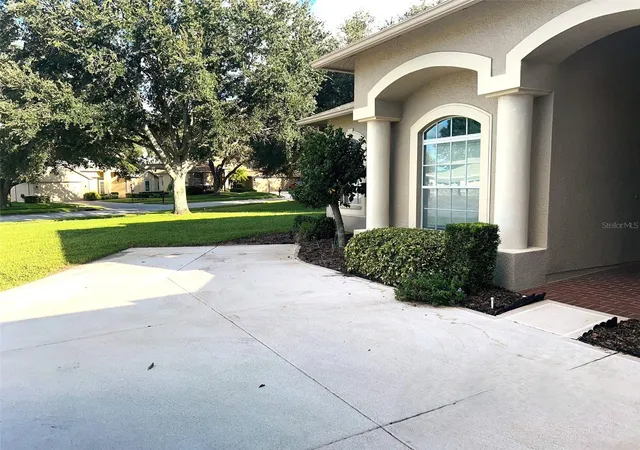 Photo 3 of Single family home for sale at 18754 Grand Clb Dr, Hudson, FL 34667 | MLS# TB8538349 | Listing updated on 2026-08-14