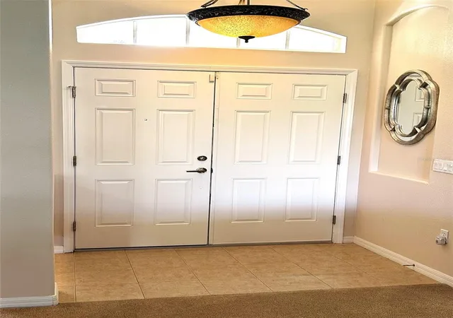 Photo 4 of Single family home for sale at 18754 Grand Clb Dr, Hudson, FL 34667 | MLS# TB8538349 | Listing updated on 2026-08-14