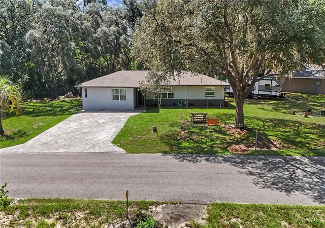 1st image of 20260 Sw 80th Pl Rd, Dunnellon, FL 34431 | MLS# OM730295