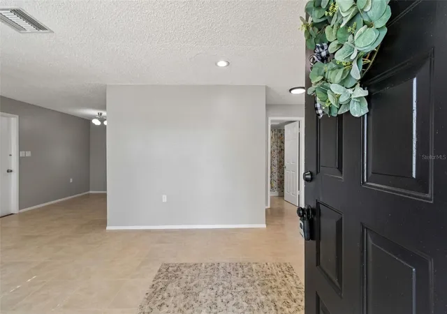 Photo 4 of Single family home for sale at 9631 Marlinton Ln, Port Richey, FL 34668 | MLS# W7888566 | Listing updated on 2026-09-24