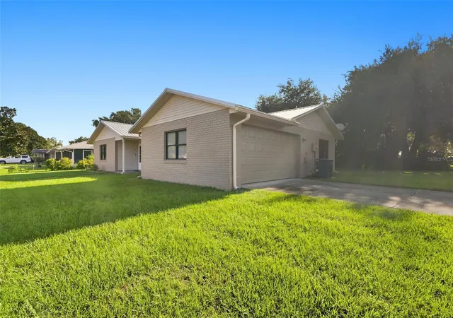 Photo 2 of Single family home for sale at 2045 Alexander Dr, Titusville, FL 32796 | MLS# O6433297 | Listing updated on 2026-09-30
