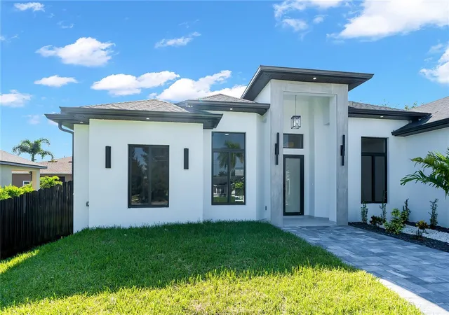 Sale Pending at 129 SW 34th Avenue, Cape Coral, FL 33991 | MLS# A4702909 | Listing updated on 2026-09-05